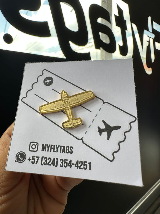 Pin Edición especial avión dorado